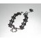 Original armband med häst i silvermetall på svart spets