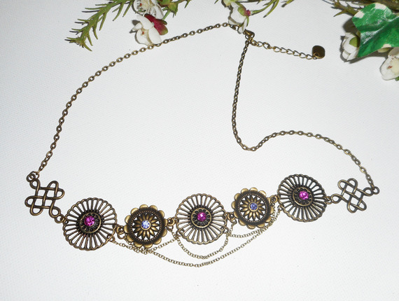 Tiara i brons med rosa och lila Swarovskikristaller
