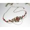 Tiara i brons med röda bohemiska kristallpärlor och blommig design