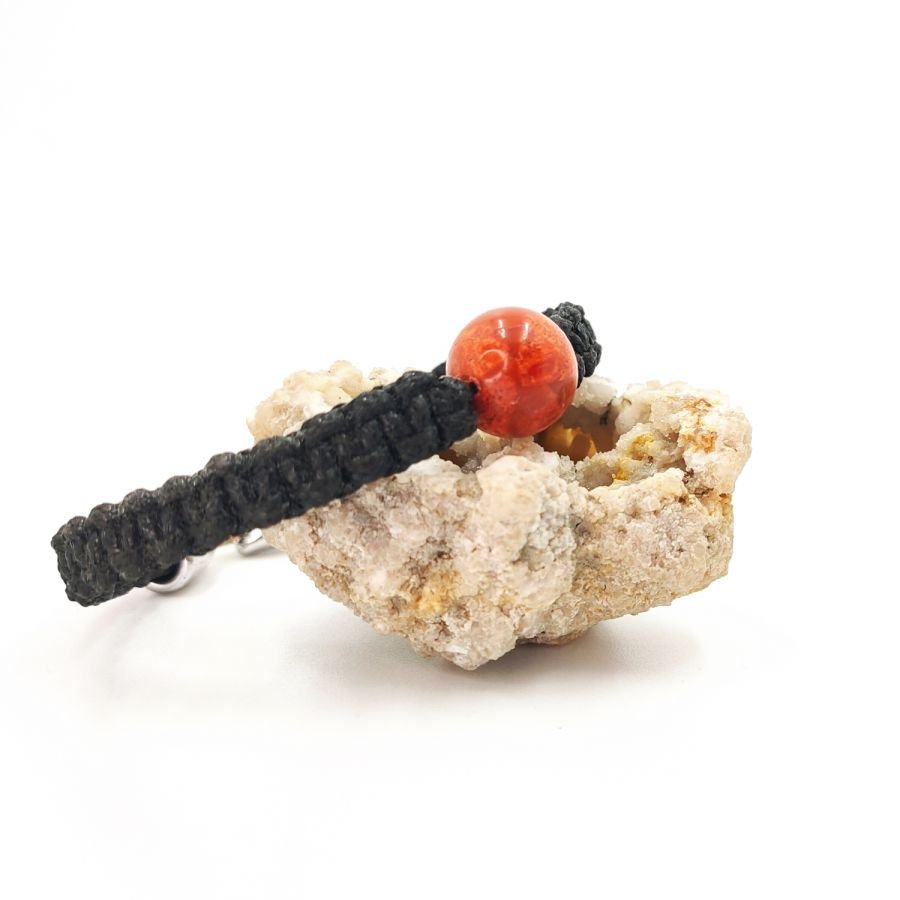 Armband i vävt rep med orange gorgonpärla