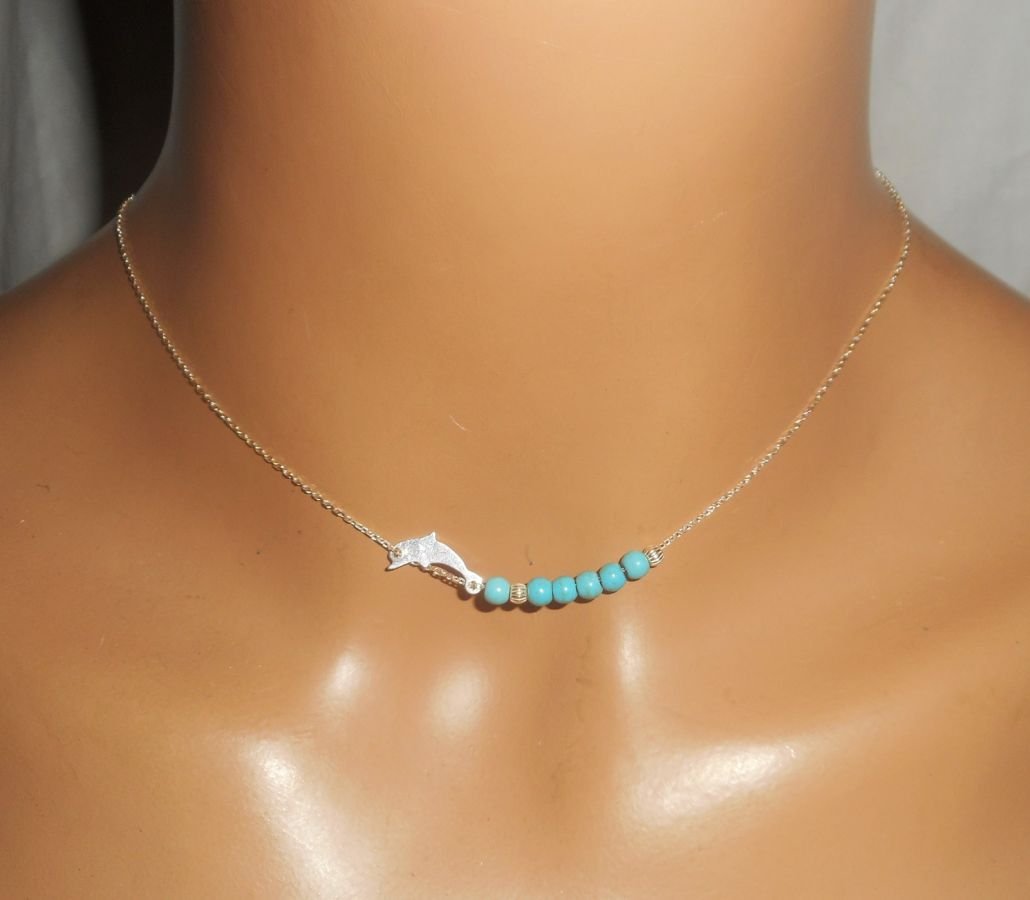 Halsband i 925 silver med liten delfin och turkosa stenar