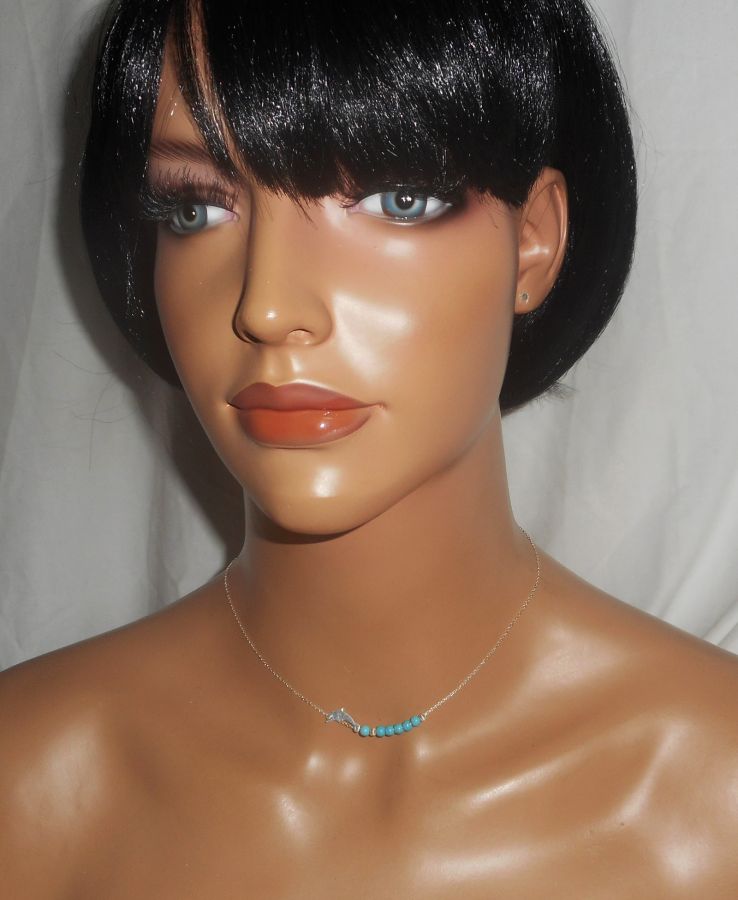 Halsband i 925 silver med liten delfin och turkosa stenar