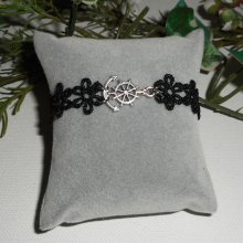 Originalarmband med ankare och roder på svart spets.
