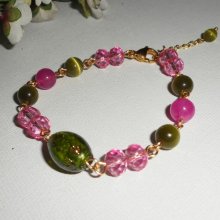Muranoglas och armband i rosa och grön kristall på guldstålkedja